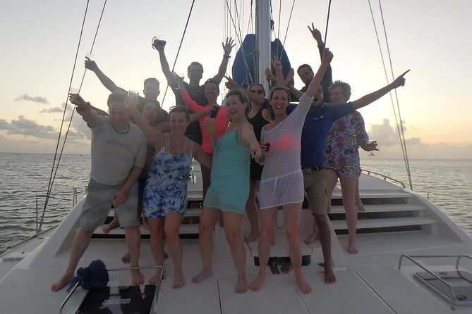 Afternoon Luxury Catamaran Sailing and Charter Cruise from Bridgetown - A small boat with a highly involved crew
