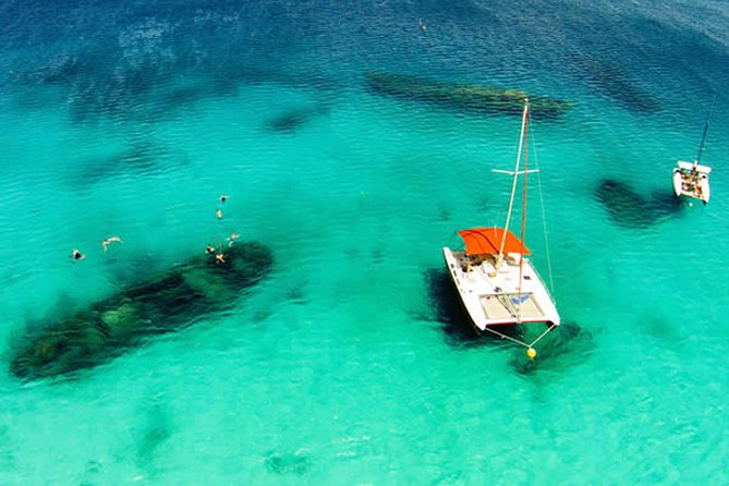 Barbados Catamaran Turtle Snorkel with Open Bar - The sail between stops, with rum punch in hand