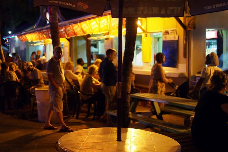 Bridgetown: Oistins reservation with drink & return transfer - Why Oistins works so well on a Friday night
