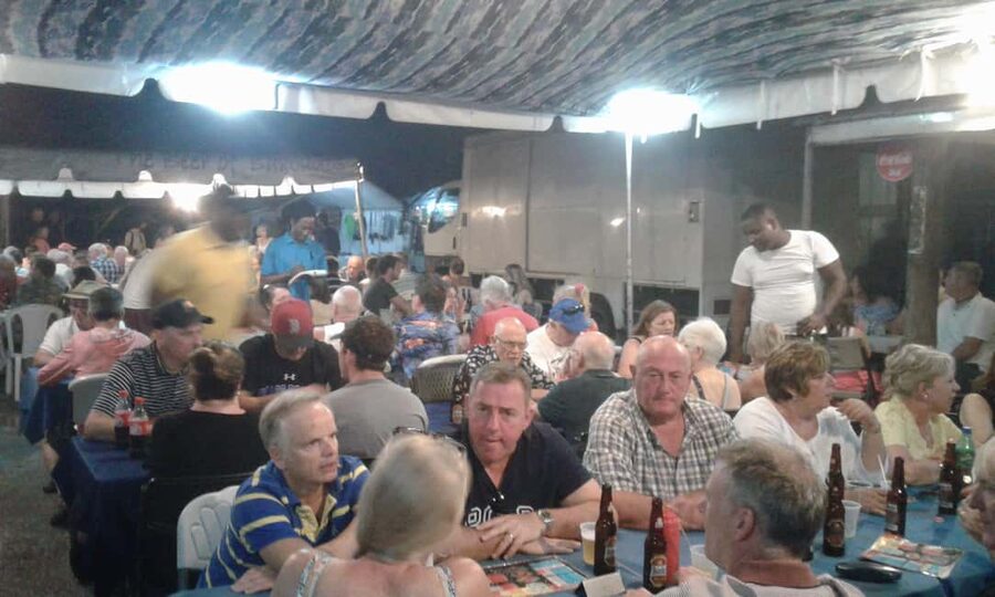 Bridgetown: Oistins reservation with drink & return transfer - Music, dancing, and the Friday-night mood